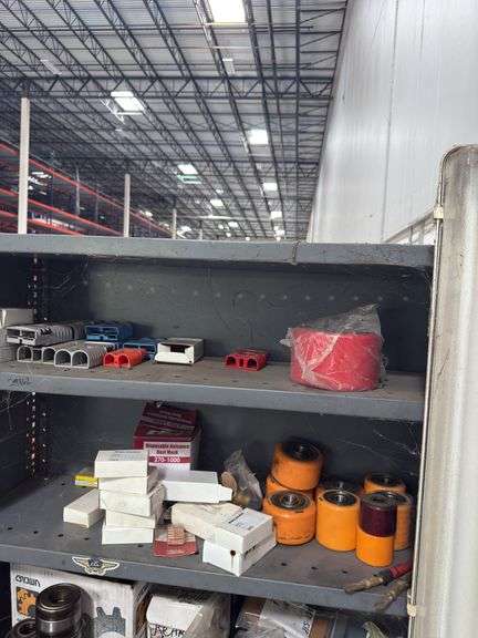 Steel Shelf Full of Bearings & Forklift Wheels