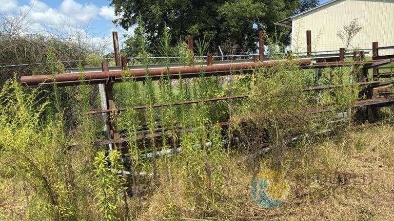 Multiple Stock Racks w/ Steel Pipe & Misc Stock image