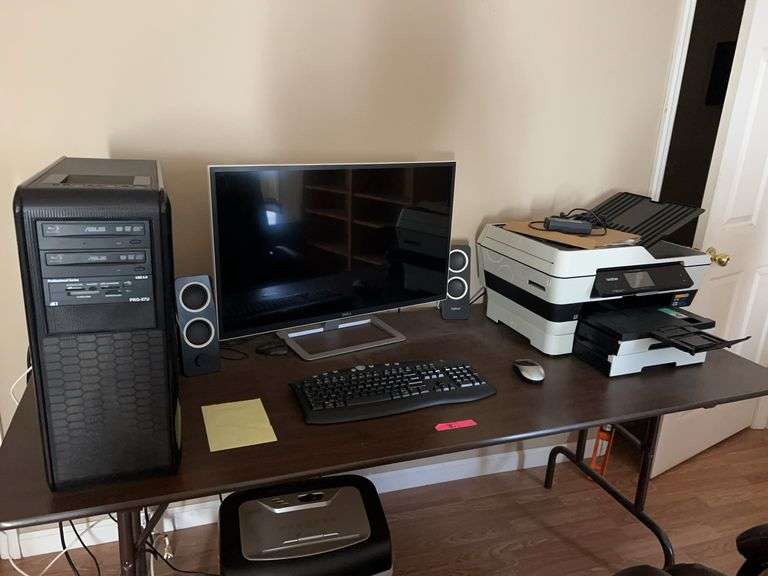 Computer with printer, speakers, and table image