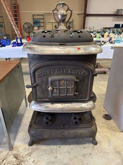 Antique Round Oak Duplex Cast Iron Stove image