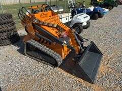Unused Land Honor Stand on Mini Skid Steer