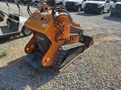 Unused Land Honor Stand on Mini Skid Steer