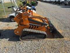 Unused Land Honor Stand on Mini Skid Steer