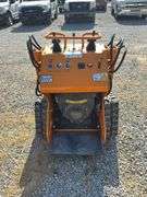 Unused Land Honor Stand on Mini Skid Steer