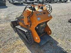 Unused Land Honor Stand on Mini Skid Steer