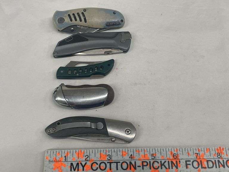 (4) Folding Pocket Knives and (1) Lighter Case image