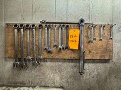 Group of Wrenches Hanging on Wall