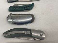 (4) Folding Pocket Knives and (1) Lighter Case