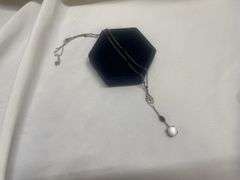 Assorted Jewelry Collection in Woven Basket