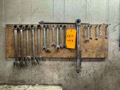 Group of Wrenches Hanging on Wall