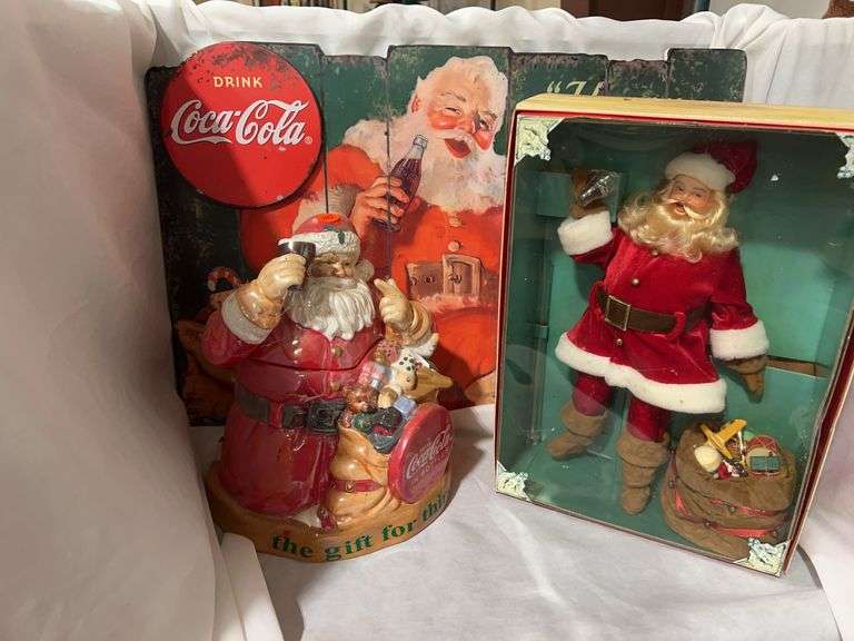 Coca-Cola Santa Collectibles - Cookie Jar, Doll, and Sign image