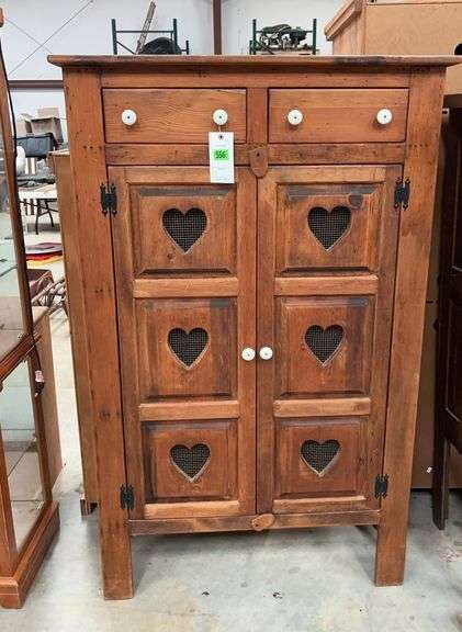 Rustic Country Cupboard with Heart Cutouts image