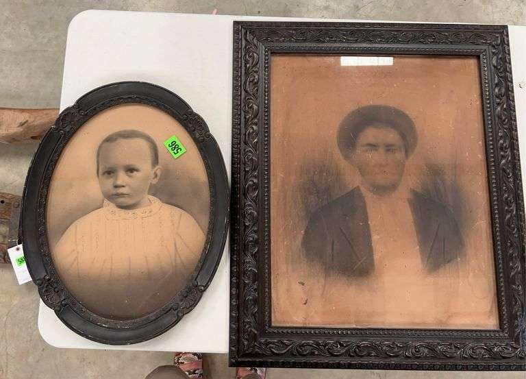 Two Framed Portrait Photographs image