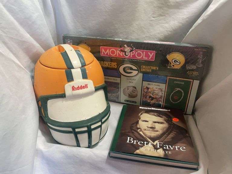 Green Bay Packers Memorabilia Lot - Monopoly Game, Brett Favre Book, and Pfaltzgraff Cookie Jar image
