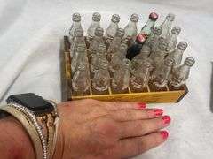 Coca-Cola Collectibles: Wooden Crate with Bottles and "Evolution of Contour Bottle" Set