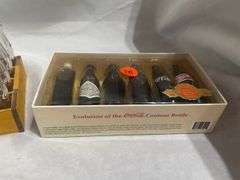 Coca-Cola Collectibles: Wooden Crate with Bottles and "Evolution of Contour Bottle" Set