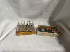 Coca-Cola Collectibles: Wooden Crate with Bottles and "Evolution of Contour Bottle" Set
