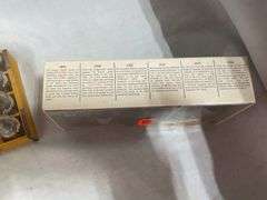 Coca-Cola Collectibles: Wooden Crate with Bottles and "Evolution of Contour Bottle" Set