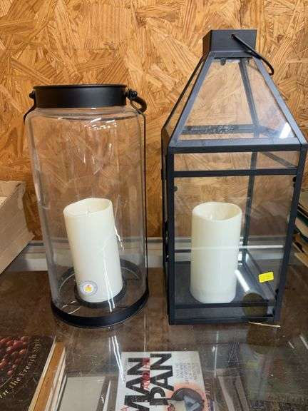 Two Metal Framed Glass Candle Lanterns with Candles image