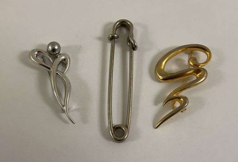 Assorted Brooches and Safety Pin Lot image