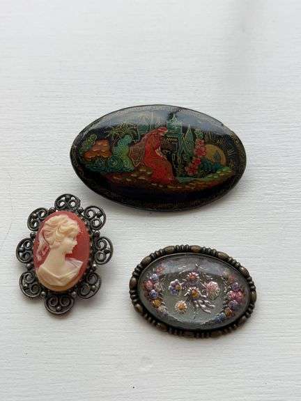 Collection of Three Decorative Brooches image