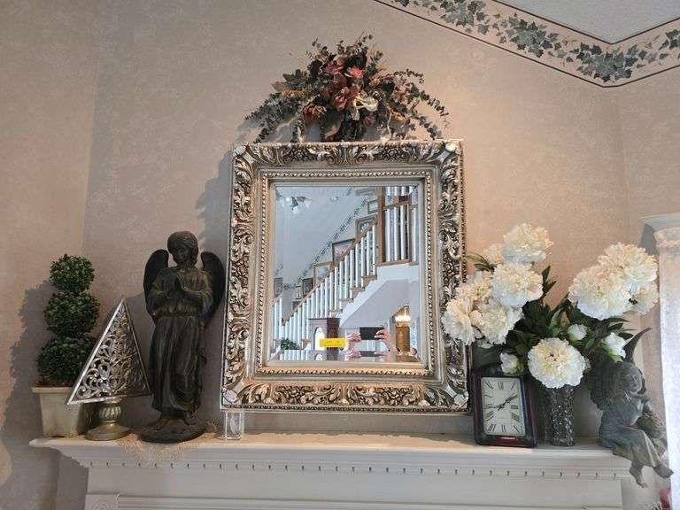 Beveled mirror, statues, top clock mantle decor image