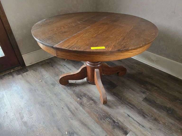 Round Oak pedestal table image