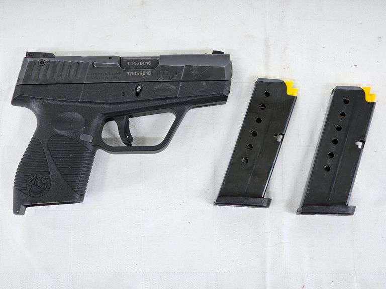 Taurus  PT709 Slim  9mm Pistol  S/N: TDN59816  2 Magazines, Original Box & Paper image