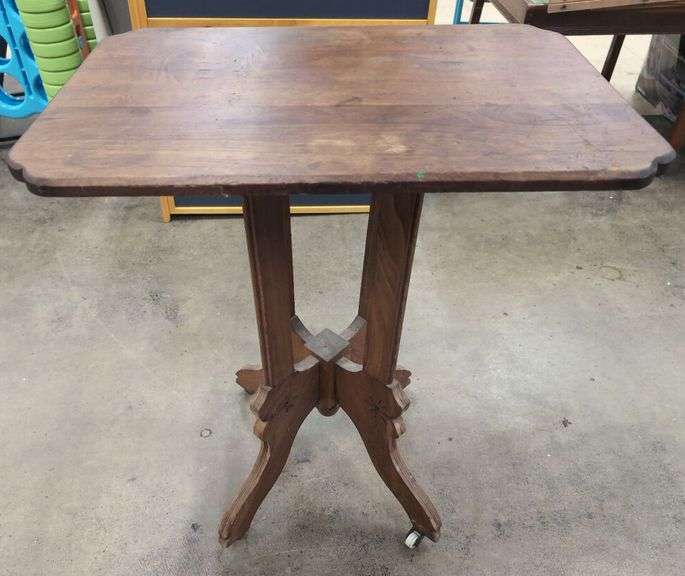 Ornate Wooden Side Table with Wheeled Feet image