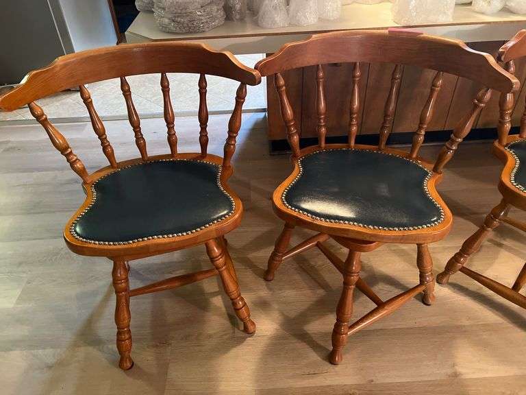 Set of 4 maple swivel chairs