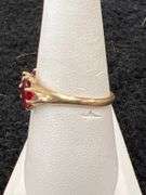 14k yellow gold with 3 red sets size 10.5