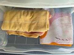 Organizers with pool care, shop rags towels and household miscellaneous