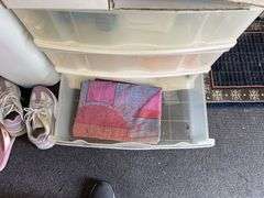 Organizers with pool care, shop rags towels and household miscellaneous