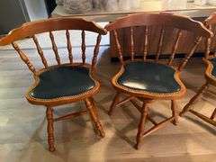 Set of 4 maple swivel chairs