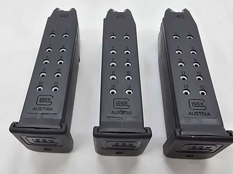 Make: Glock  Caliber: .40  Model: G23  S/N: MBU295  3 Magazines, Paper, Case, Child lock, Cleaning Brush & 2 Shells