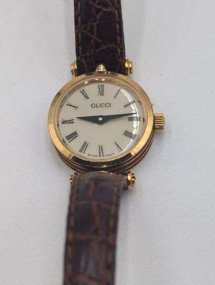 Ladies Gucci gold filled wristwatch with leather band image