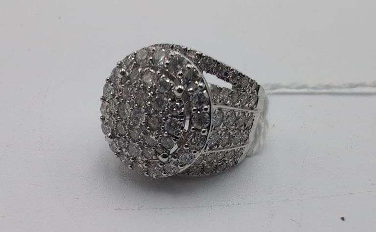 10K white gold and diamond ring. image