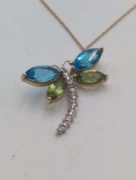 10k yellow gold dragonfly pendant set with colored stones and very small single cut diamonds image
