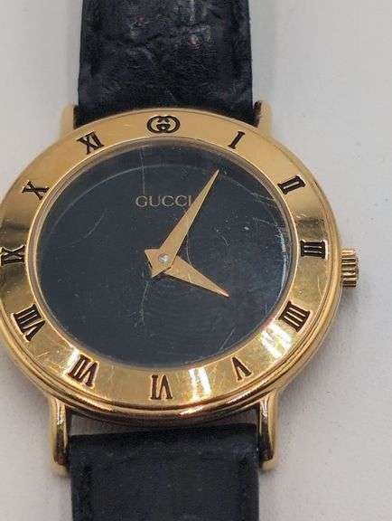 Ladies Gucci gold filled case wristwatch with leather band image
