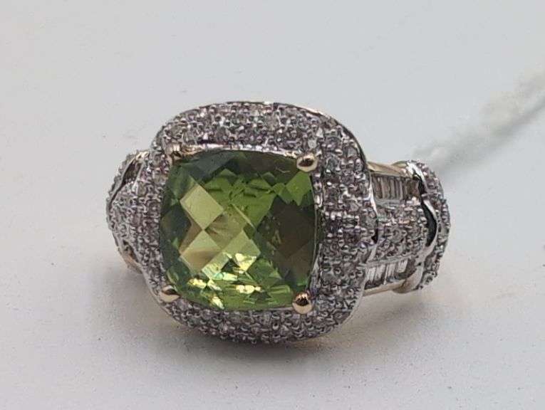 14K yellow gold, peridot and diamond ring. image