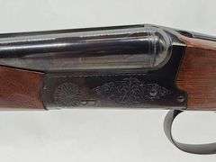 BROWNING  20 GAUGE HIGH GLOSS   SIDE BY SIDE SHOTGUN   SN# 02604PY168  3" CHAMBER