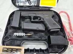 Make: Glock  Caliber: .40  Model: G23  S/N: MBU295  3 Magazines, Paper, Case, Child lock, Cleaning Brush & 2 Shells