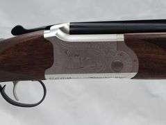 American Tactical   12 gauge over under shotgun  Cavalry Model   sn# 720-H24UU-14488