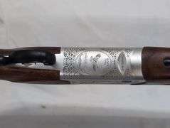 American Tactical   12 gauge over under shotgun  Cavalry Model   sn# 720-H24UU-14488