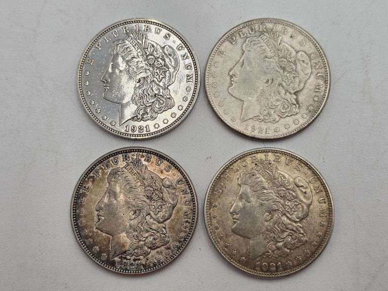 four 1921 Morgan Silver Dollars image