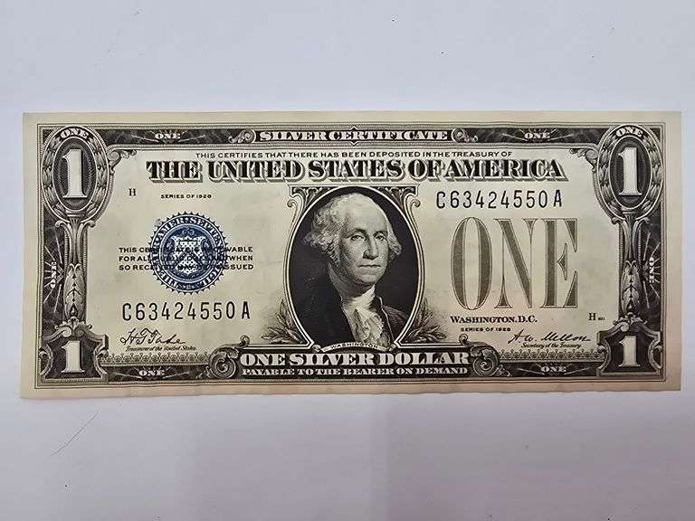 Crisp Uncirculated Series of 1928 Silver Certificate "Funny Back" $1.00 note image