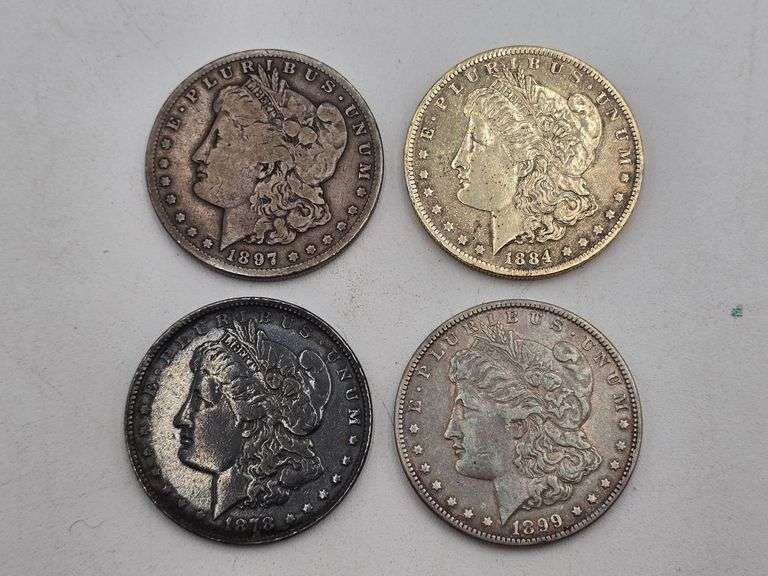 four Morgan Silver Dollars 1878, 1884-O, 1897-S, 1899-O image
