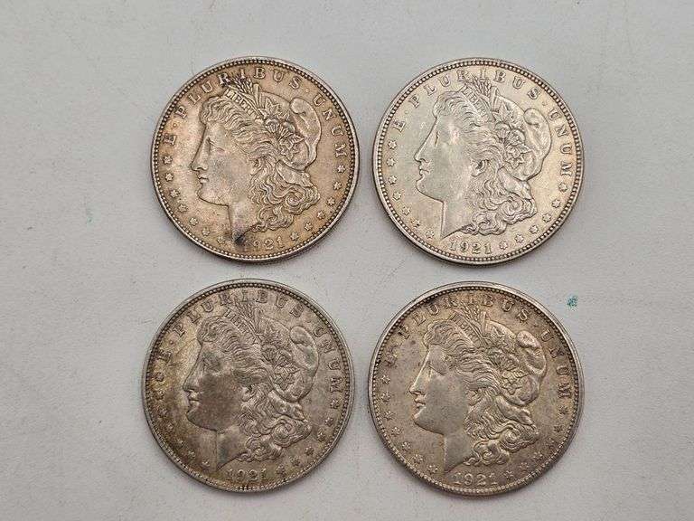 four 1921 Morgan Silver Dollars image