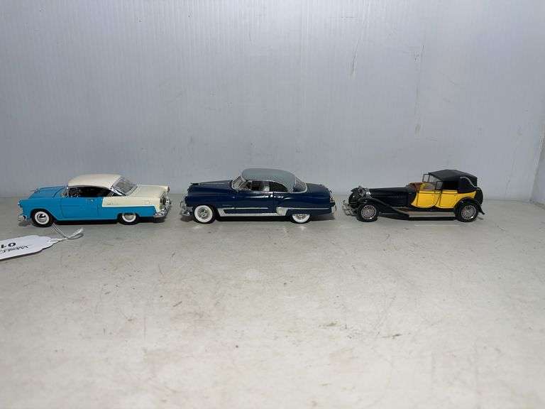 Diecast Car Models: 1955 Chevy, 1949 Cadillac, and Black & Yellow Car