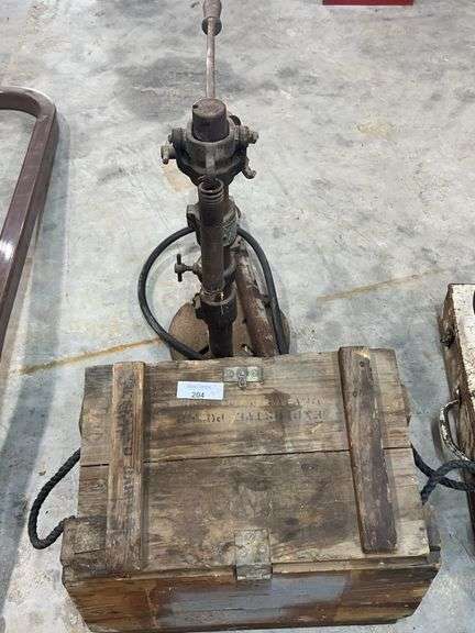 Vintage Rivet Machine with Assorted Tools and Parts image
